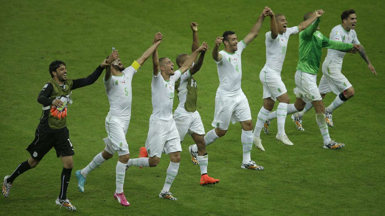 US draws, Belgium advances, Algeria wins