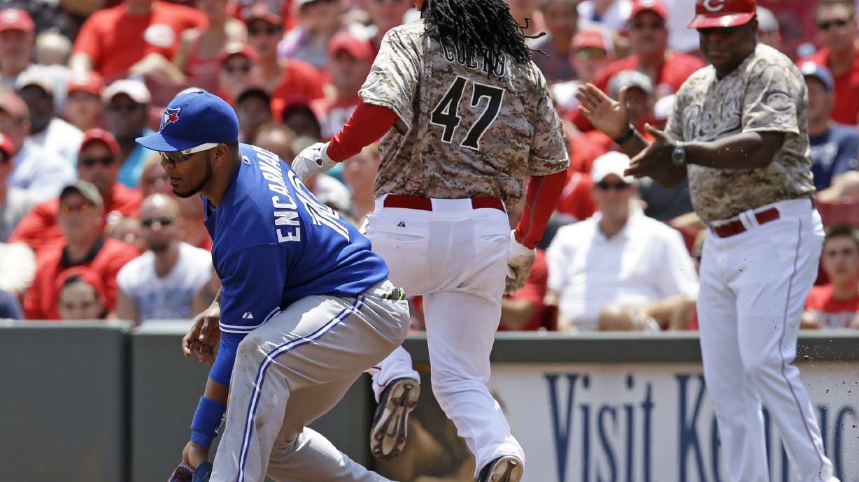 Cueto pitches Reds past Blue Jays 4-3