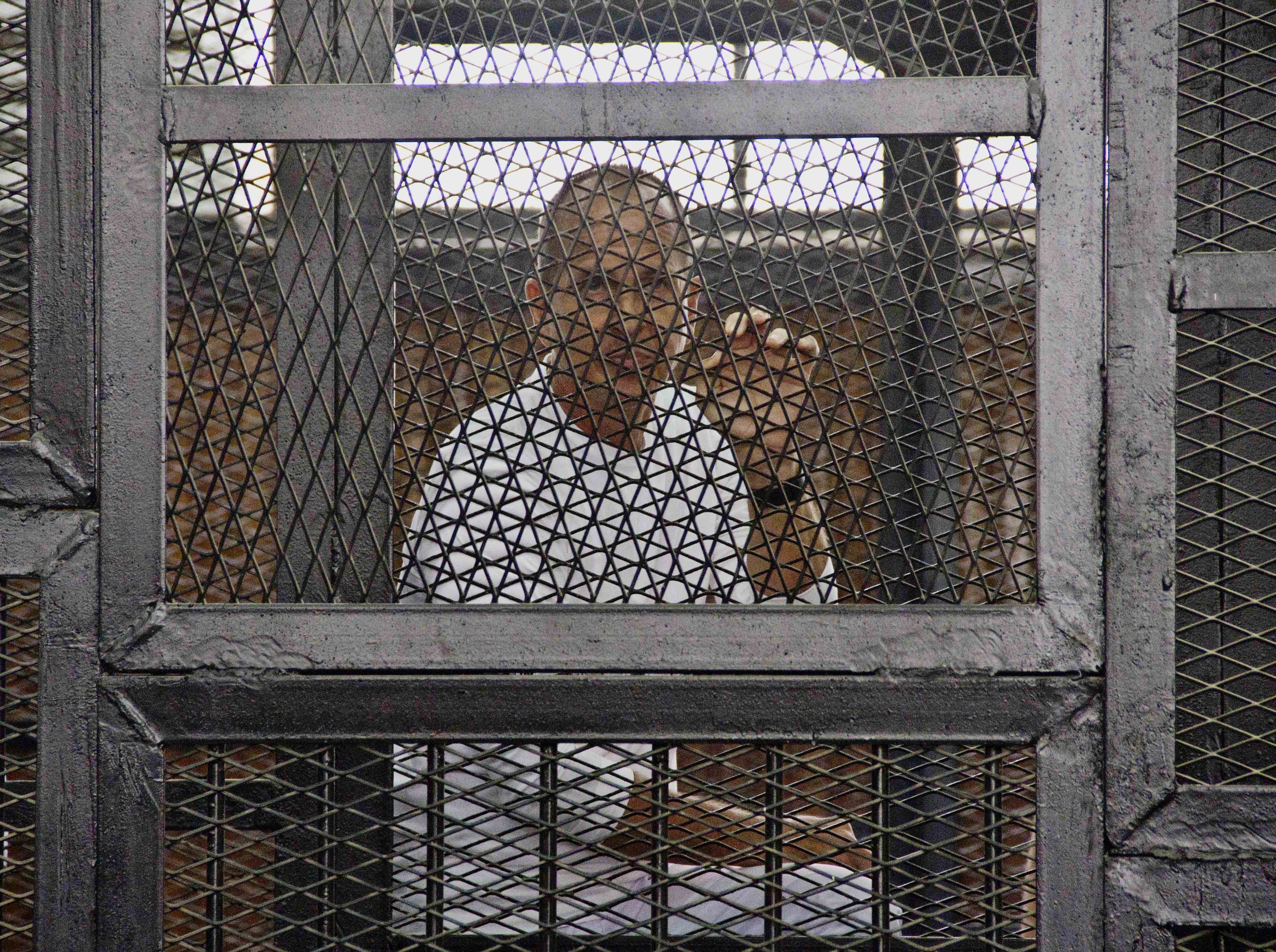 Outcry after Egypt sentences 3 reporters to prison