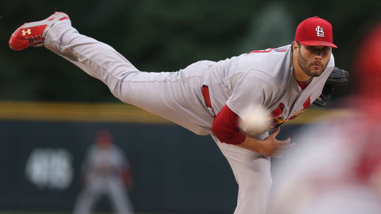 Lynn, Adams lead Cards to 8-0 win over Rockies