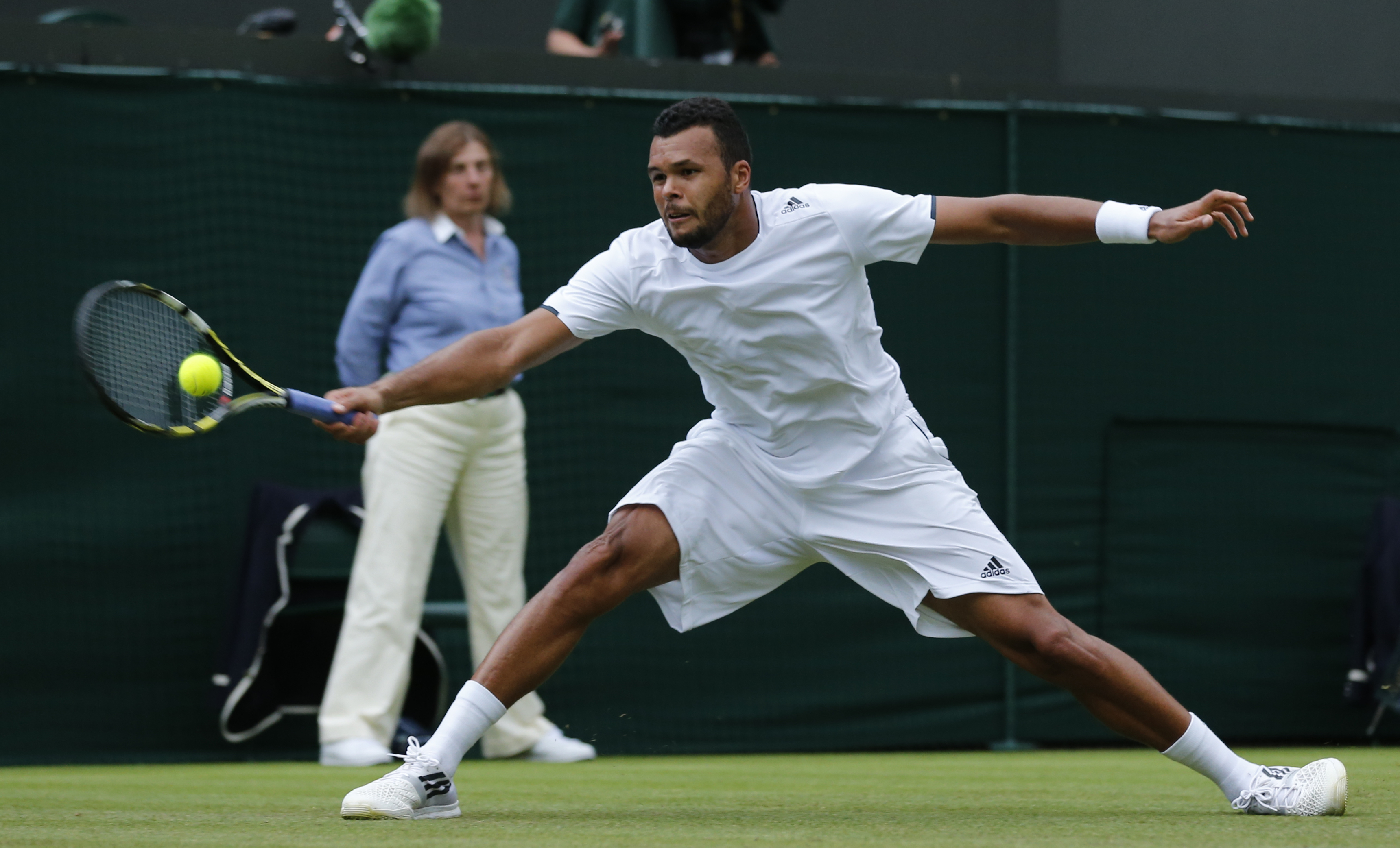 Tsonga finishes off Melzer quickly at Wimbledon