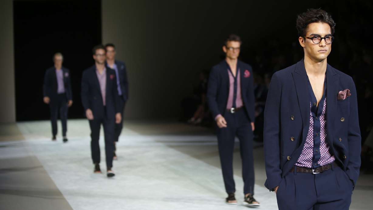 Milan designers nudge men to dress with derring-do