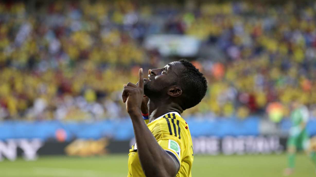 Colombia tops World Cup group by beating Japan 4-1