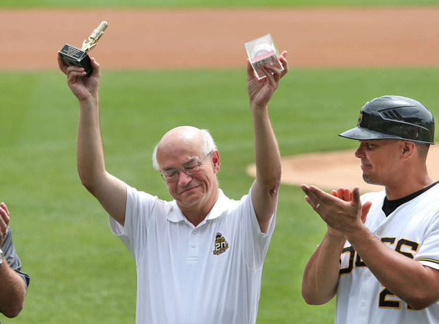 Team broadcaster Steve Klauke is applauded by manager Keith Johnson as he is honored before calling his 3000th game as the Salt Lake Bees play the Nashville Sounds in Triple A baseball Tuesday, June 24, 2014, in Salt Lake City.