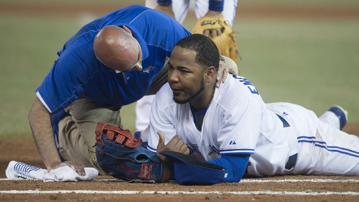 Reyes scores on 9th-inning error, Jays top Yanks