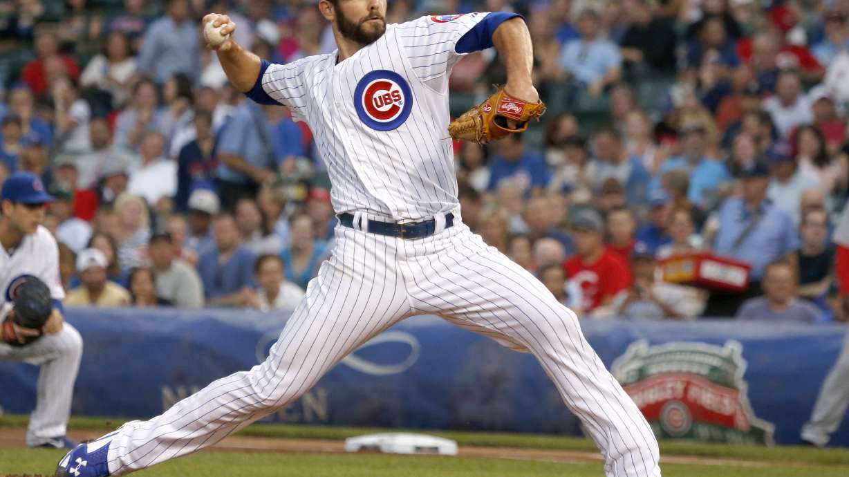 Arrieta leads Cubs past Reds 7-3