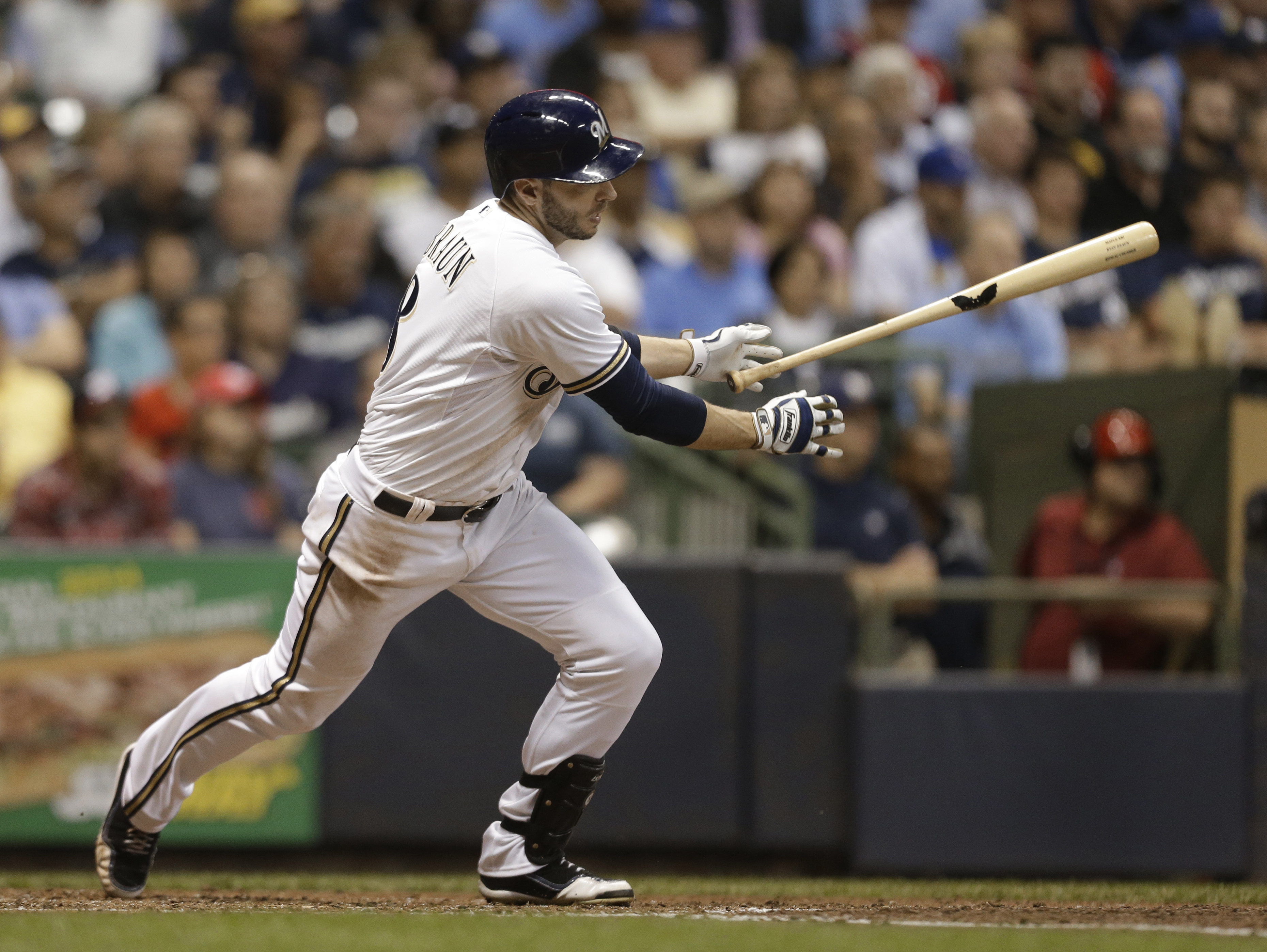 Brewers waste chances, lose 4-3 to Nats in 16