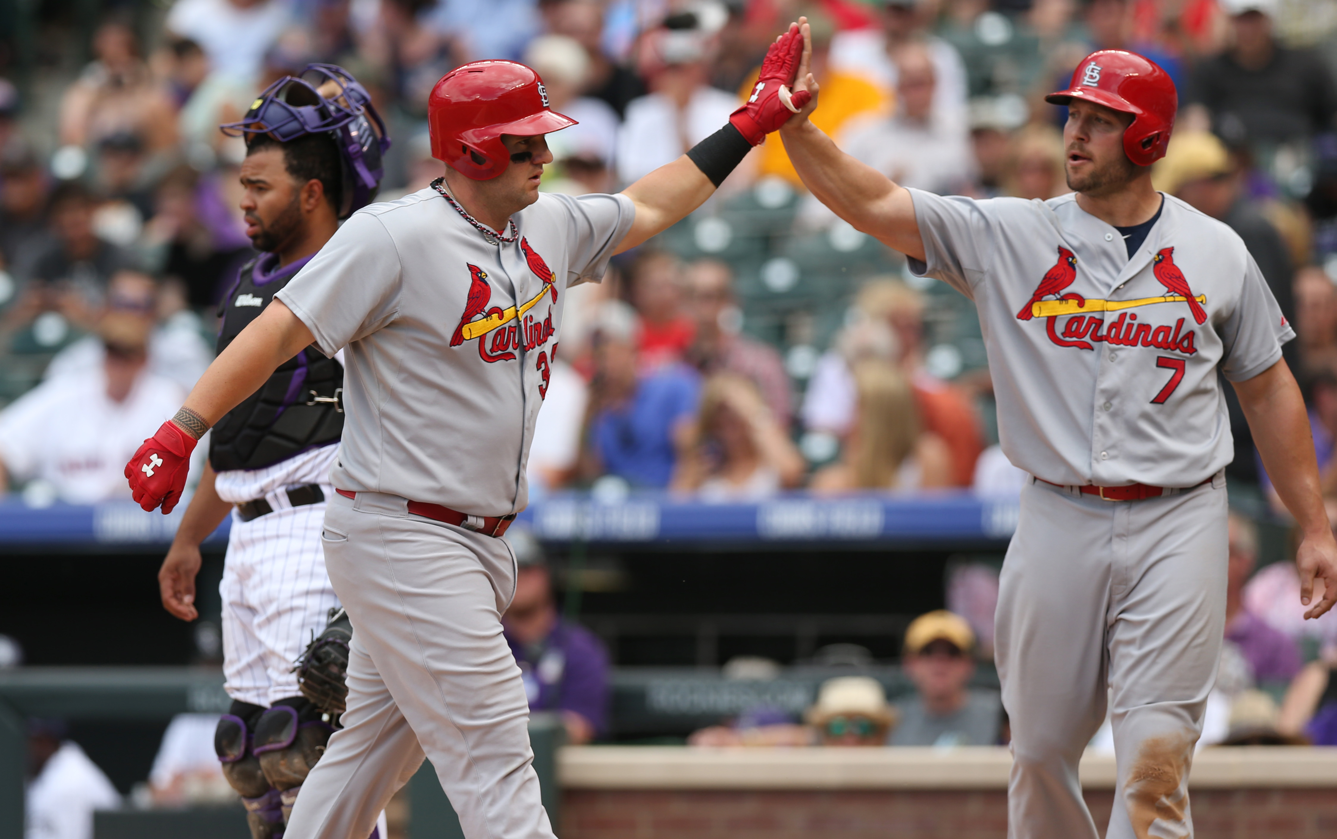 Adams homers, Cardinals rally to beat Rockies 9-6