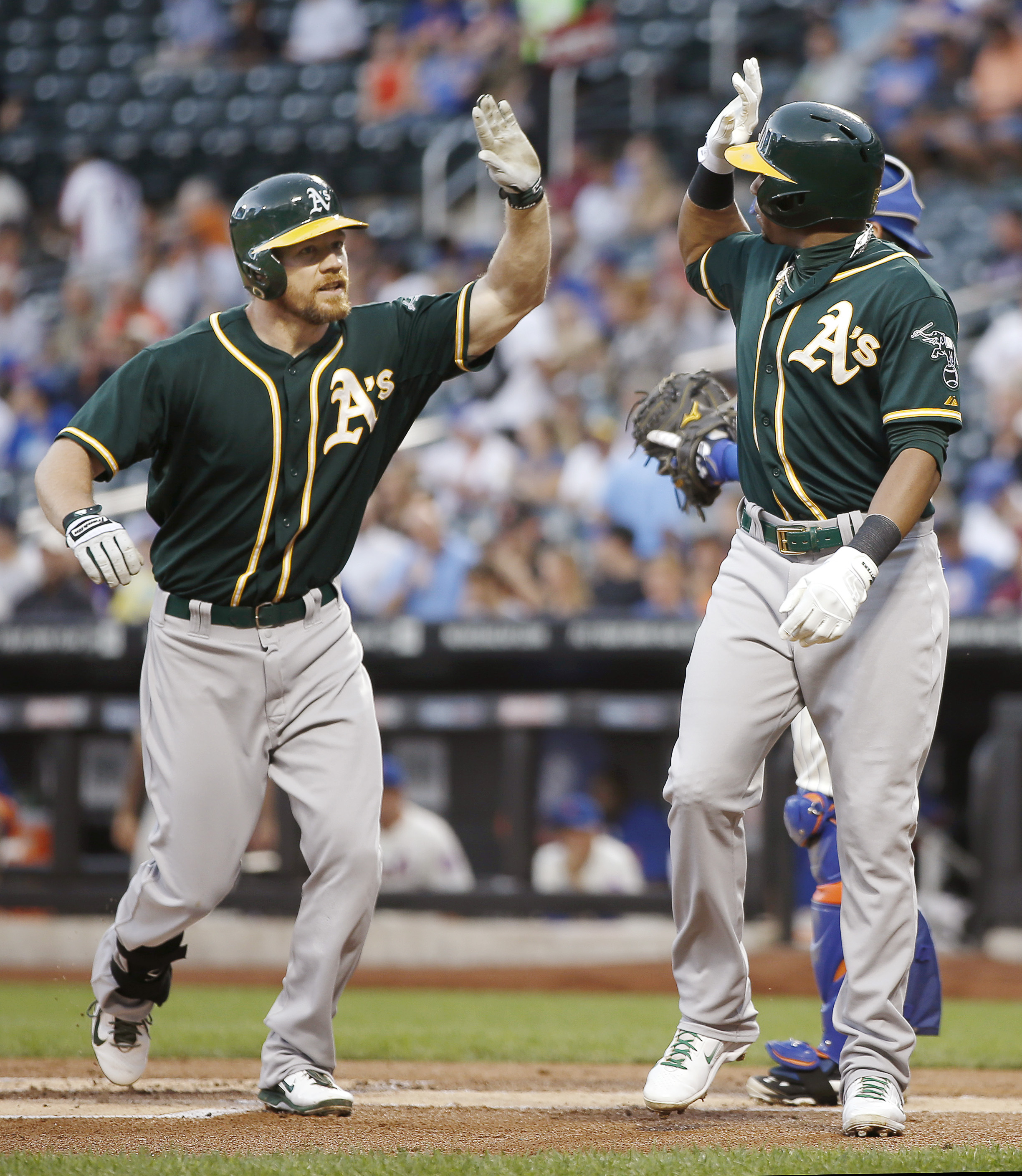 Cespedes, Moss send Mills and A's past Mets 8-5