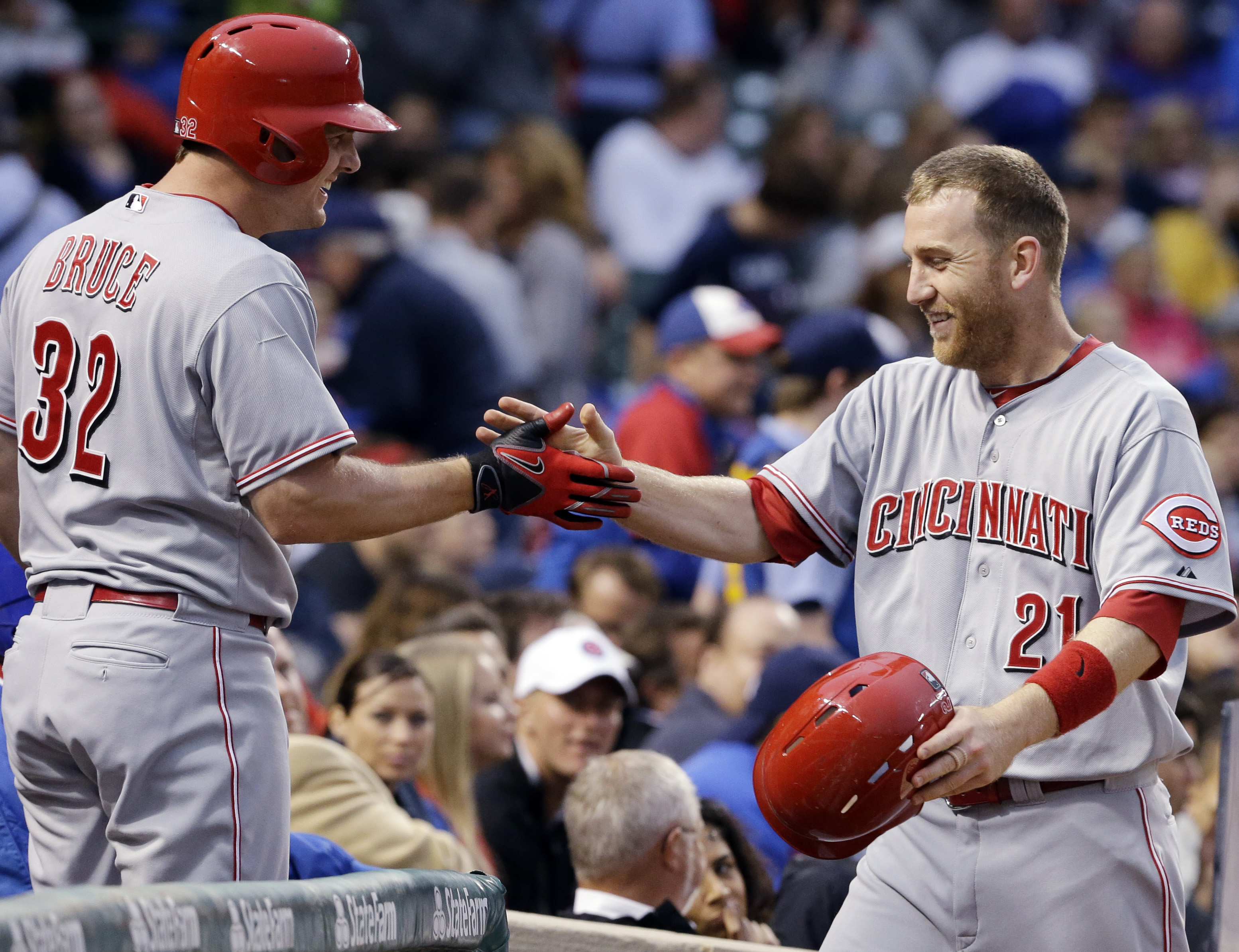 Latos helps Reds beat Cubs 4-1