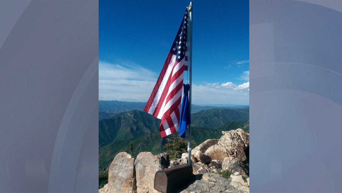 LDS missionaries install illegal flagpole on top of Mount Olympus