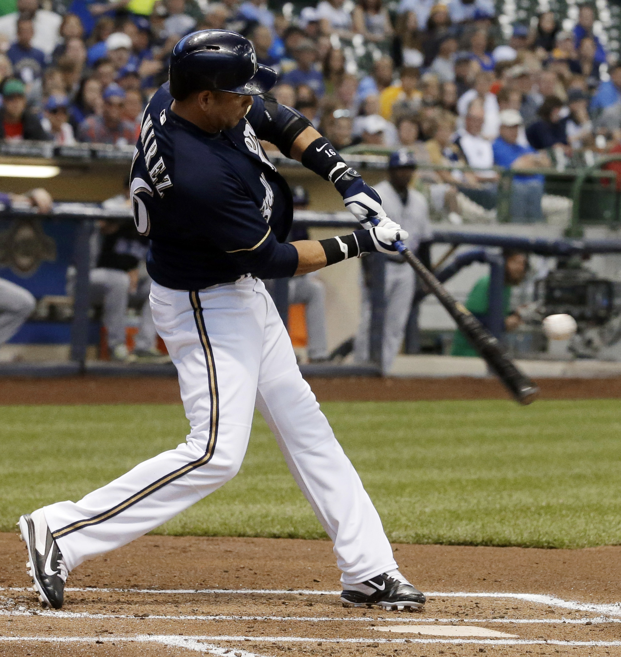 Weeks, Peralta help Brewers beat Rockies 7-4