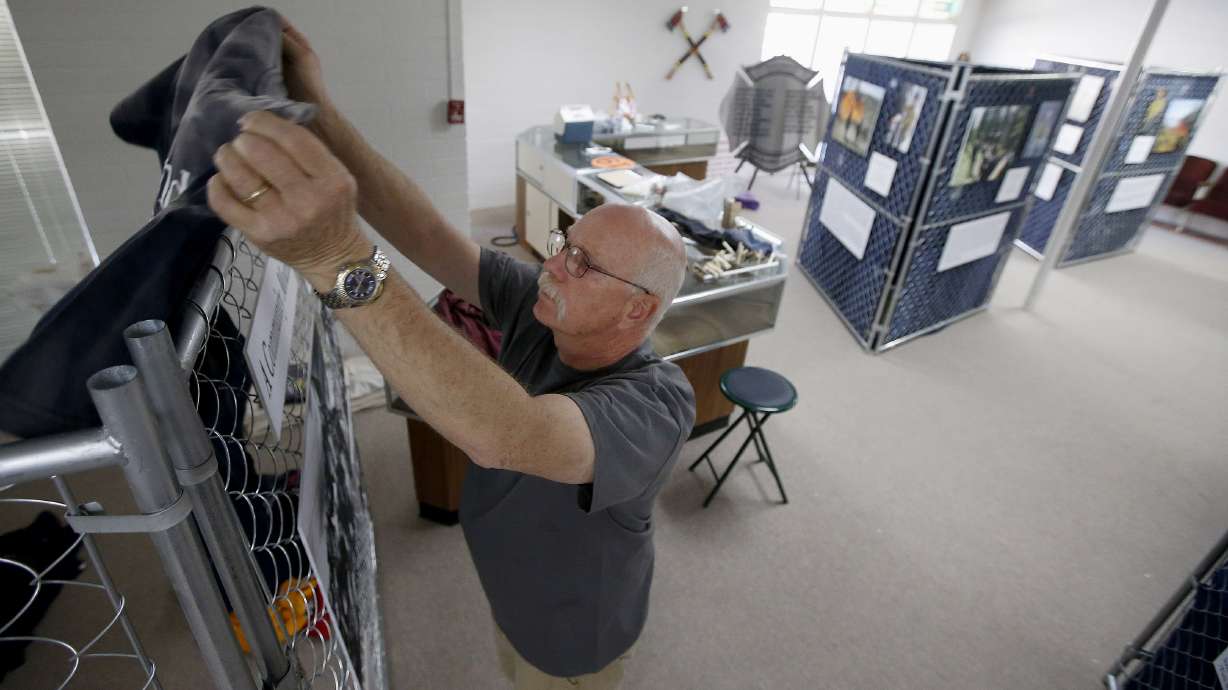 AP PHOTOS: Memorial fence honored firefighters