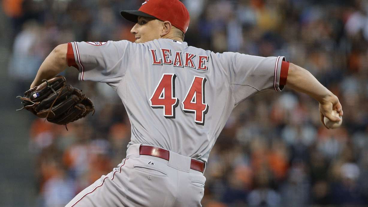 Leake strikes out career-high 12 in Reds win