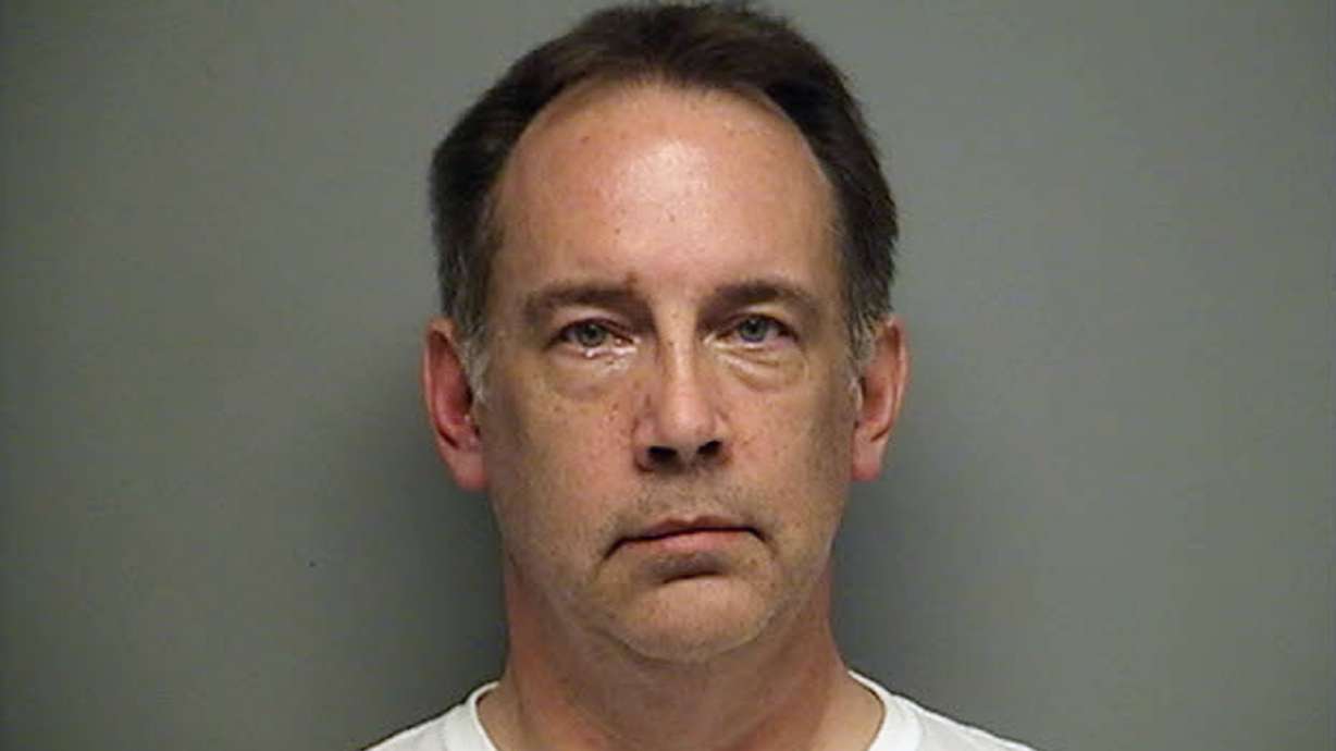 Bond set at $1M for ex-cop in suitcase deaths