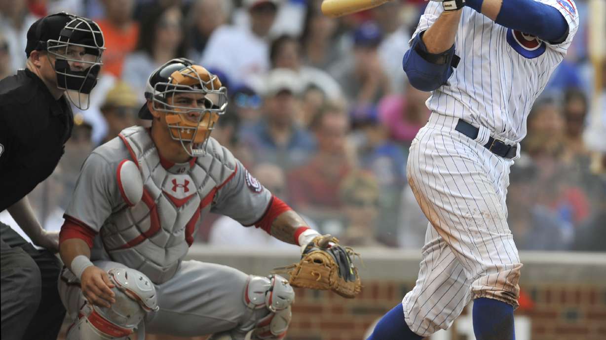 Baker, Hammel help Cubs beat Nationals 7-2
