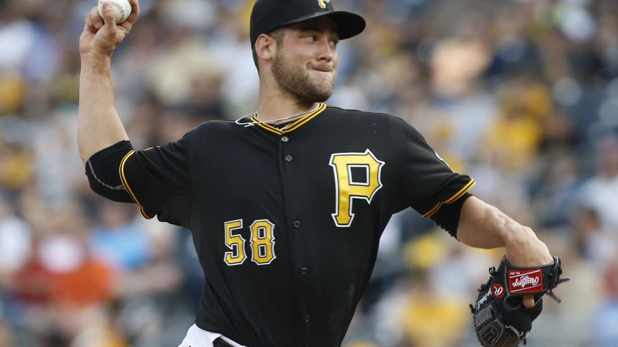 Harrison lifts Pirates over Mets 3-2 in 11 innings