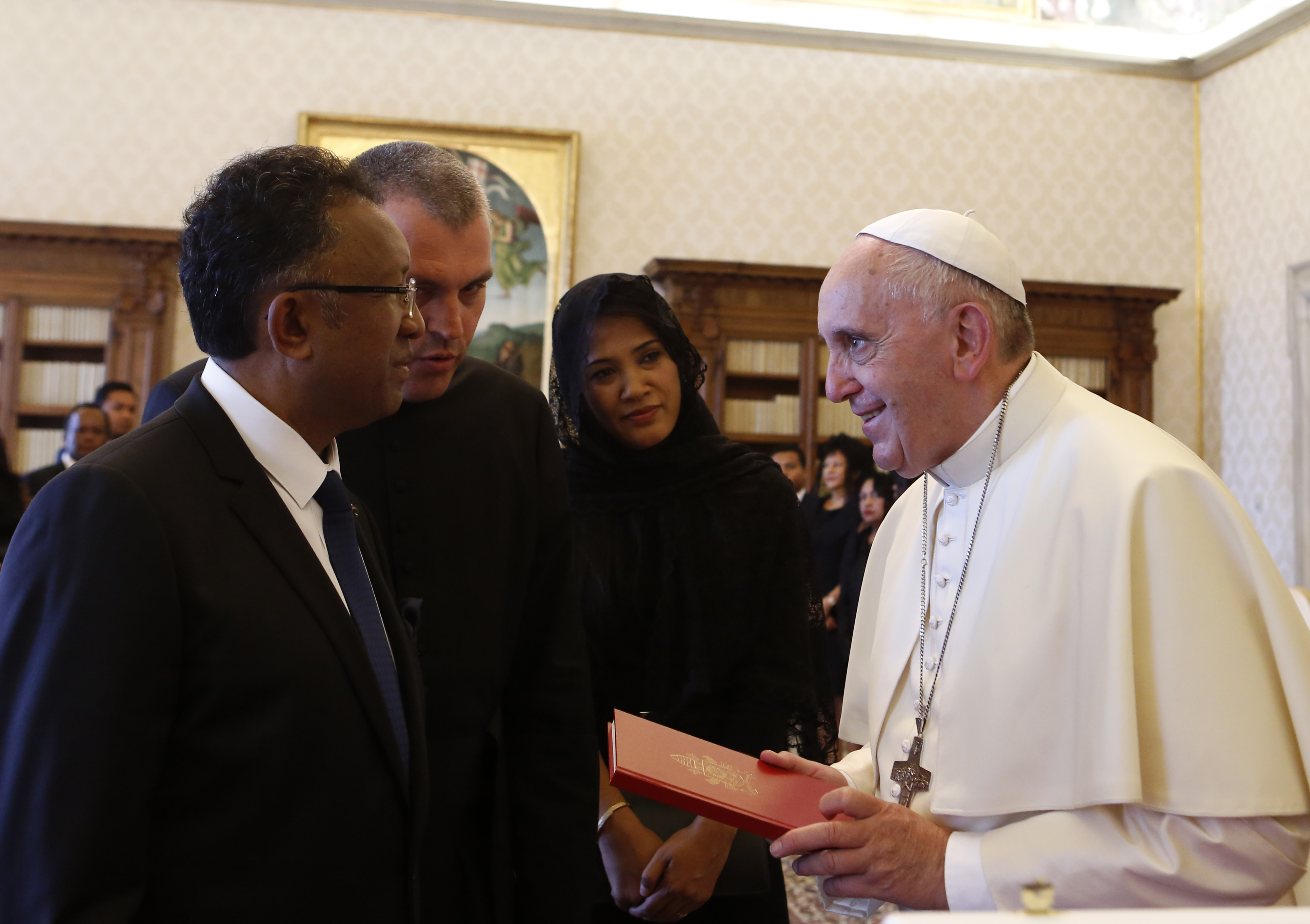 Pope tired but smiling amid new health concerns