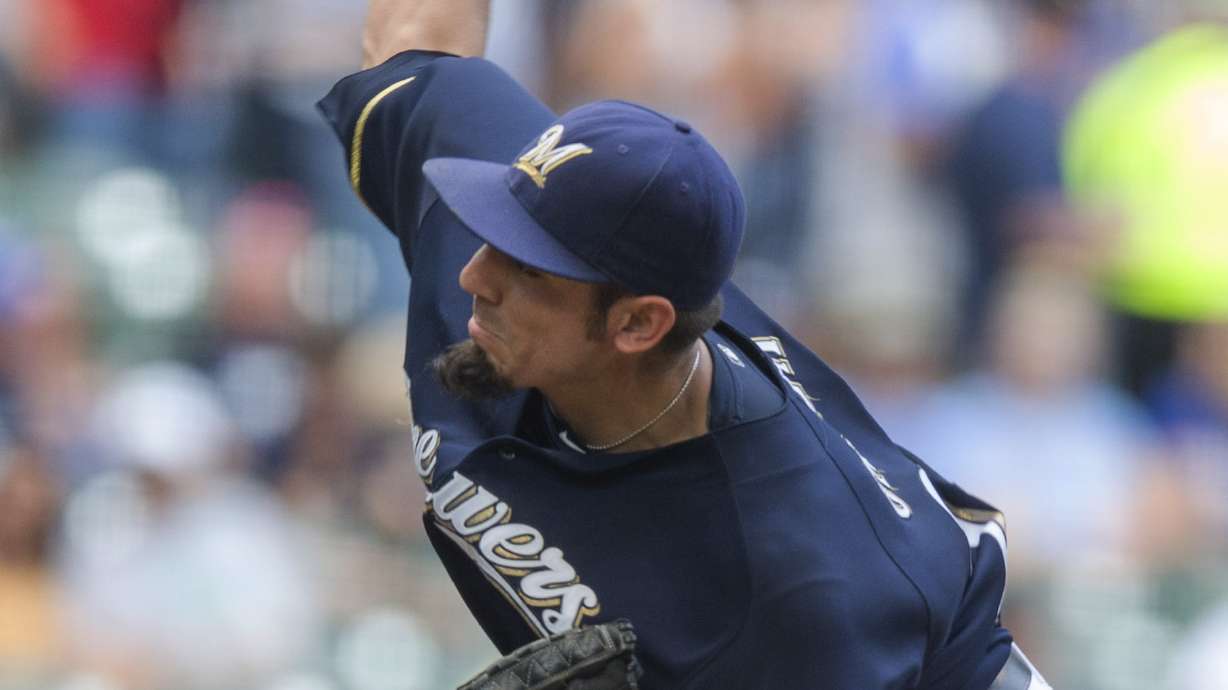 Gomez, Garza lead Brewers over Rockies 7-4
