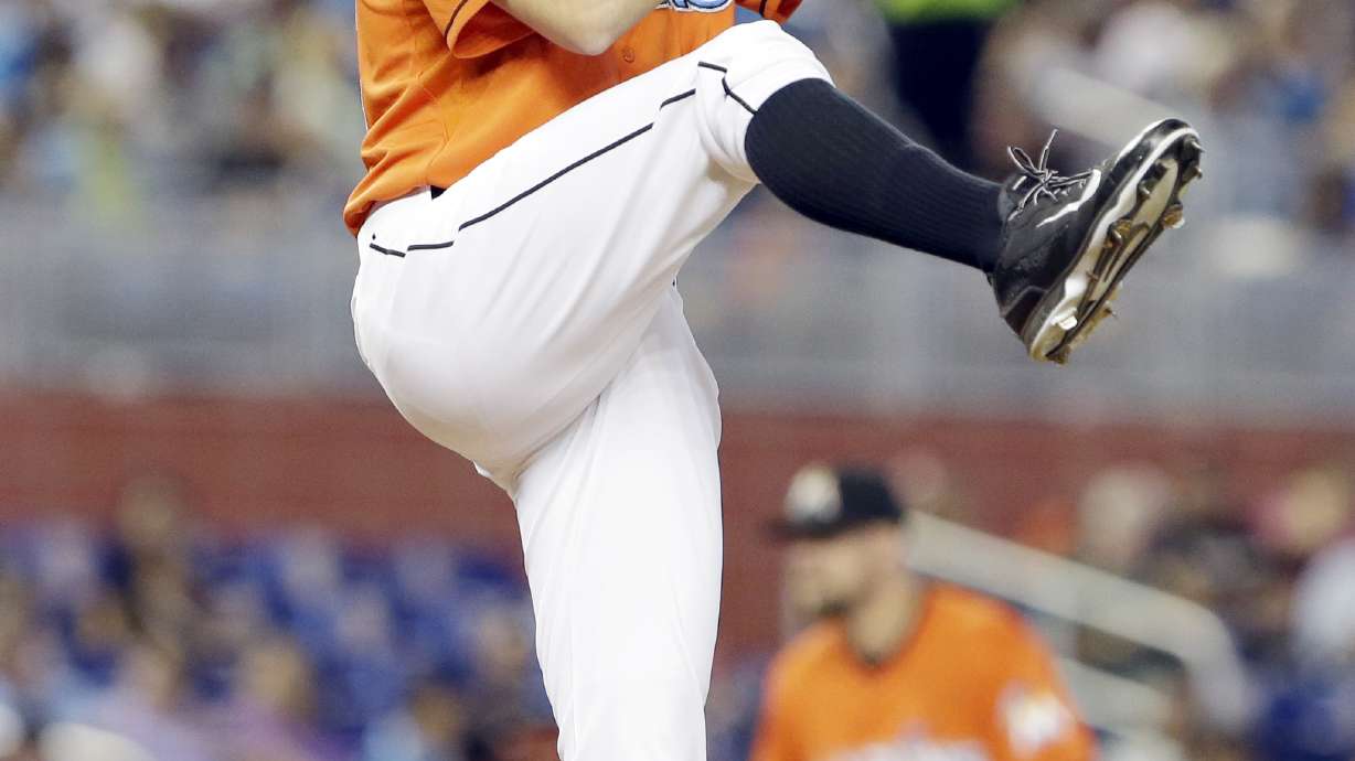 A's complete sweep of Marlins, 4-3