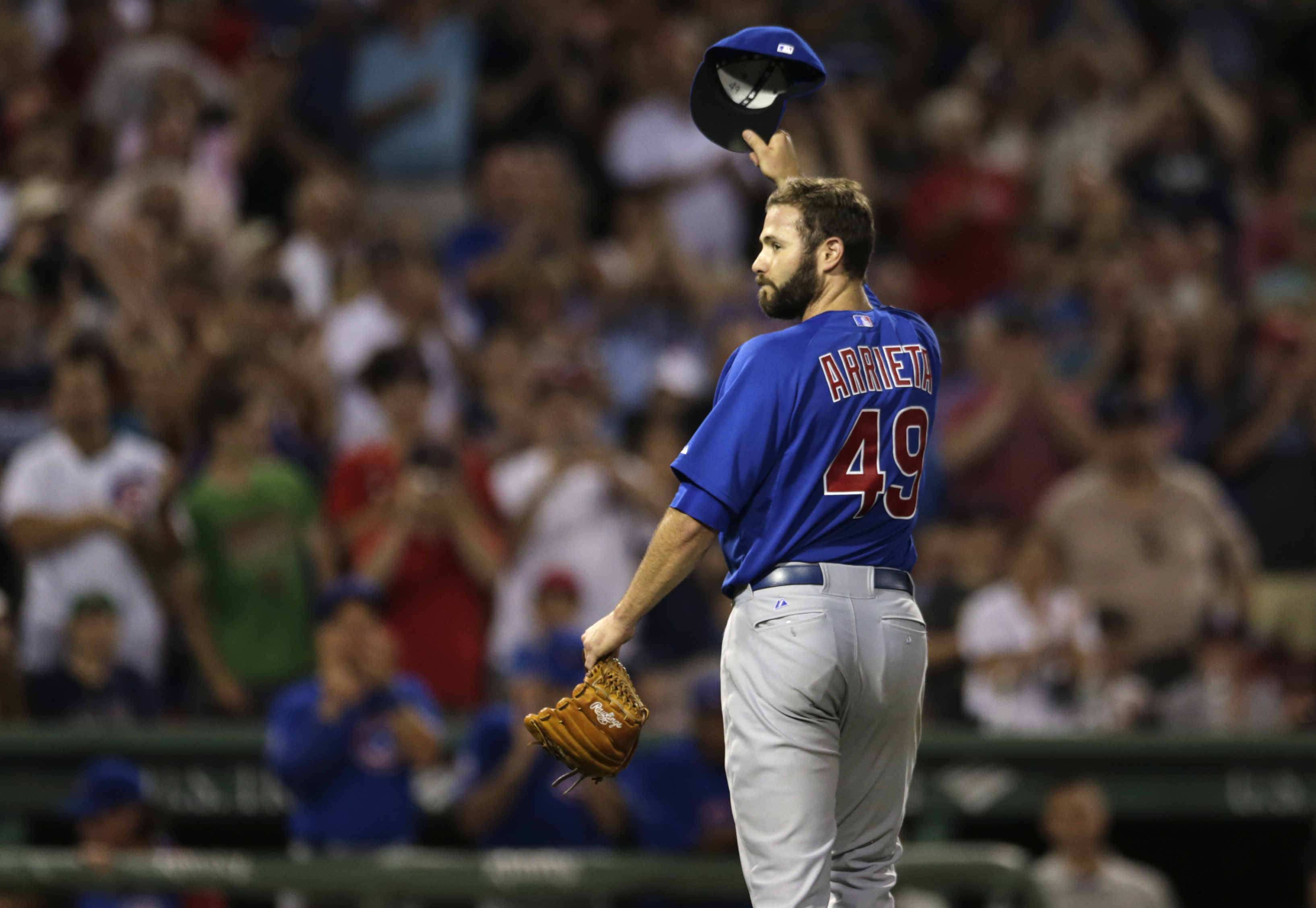 Arrieta tales no-hit bid into 8th for Cubs