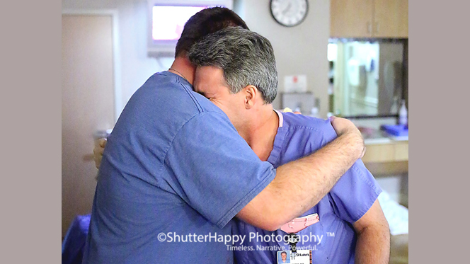 Emotional hug between new dad, doctor in delivery room goes viral