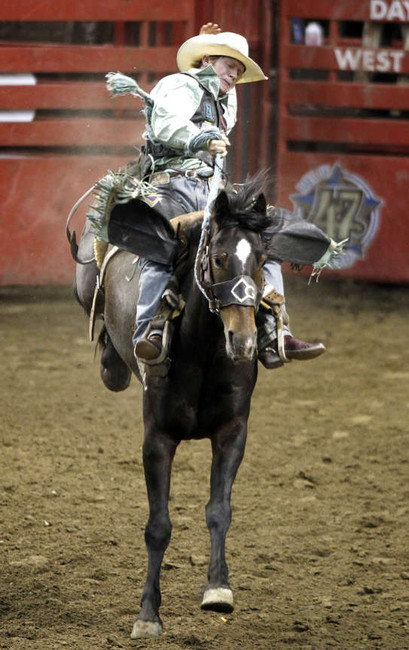 Jacobs Crawley competes in the saddle bronc competition at the 
Days of '47 Rodeo at the Maverik Center in West Valley City on 
Tuesday, July 24, 2012. This is the largest rodeo in Utah and one of 
the state's oldest traditions.
PRCA consistently votes Days of '47 Rodeo as one of the country's 
top rodeos. Professional, nationally ranked cowboys and cowgirls 
head to Utah to compete for more than $200,000 in prize money as 
they challenge the Bar T's award winning rodeo stock. The Bar T 
Rodeo returns to the Days of '47 with their world champion 
livestock.
Events include bareback and saddle bronc riding, bull riding, barrel 
racing, team roping, steer wrestling and tie-down roping. (Laura 
Seitz, Deseret News)