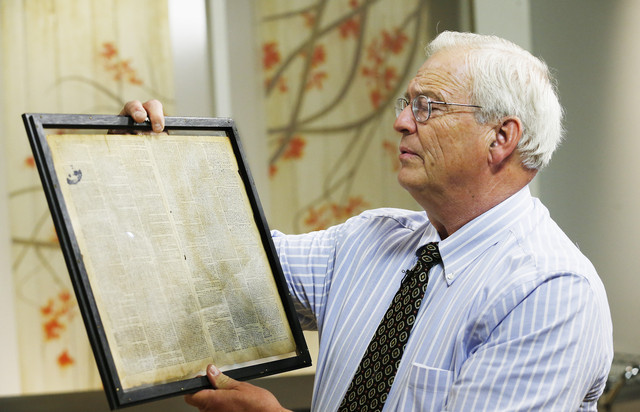 Brent Ashworth holds a rare 238-year-old original issue of the July 3, 
1776, edition of the Pennsylvania Gazette in Salt Lake City Tuesday, 
July 1, 2014. This newspaper was at one time owned by Benjamin 
Franklin and contains the first published announcement of the 
Declaration of Independence, which appears halfway down the third 
column of page two.