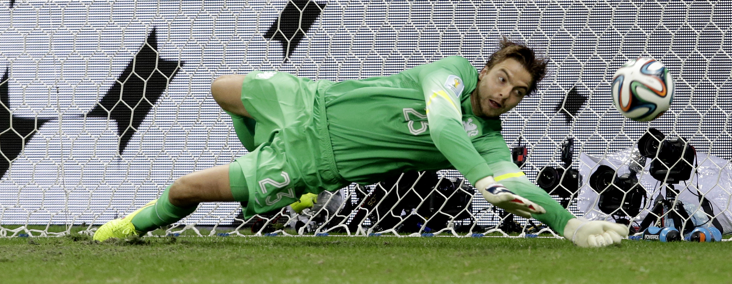 Messi guides Argentina into semis, Dutch scrape in