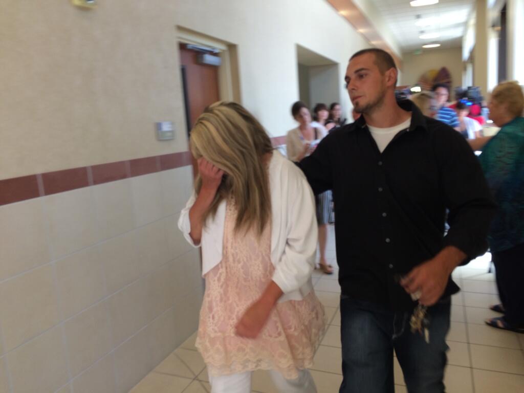 Timothy Walker's mother and brother left the courtroom in tears. "I
still love my son," she said. (Photo: Sandra Yi/KSL)