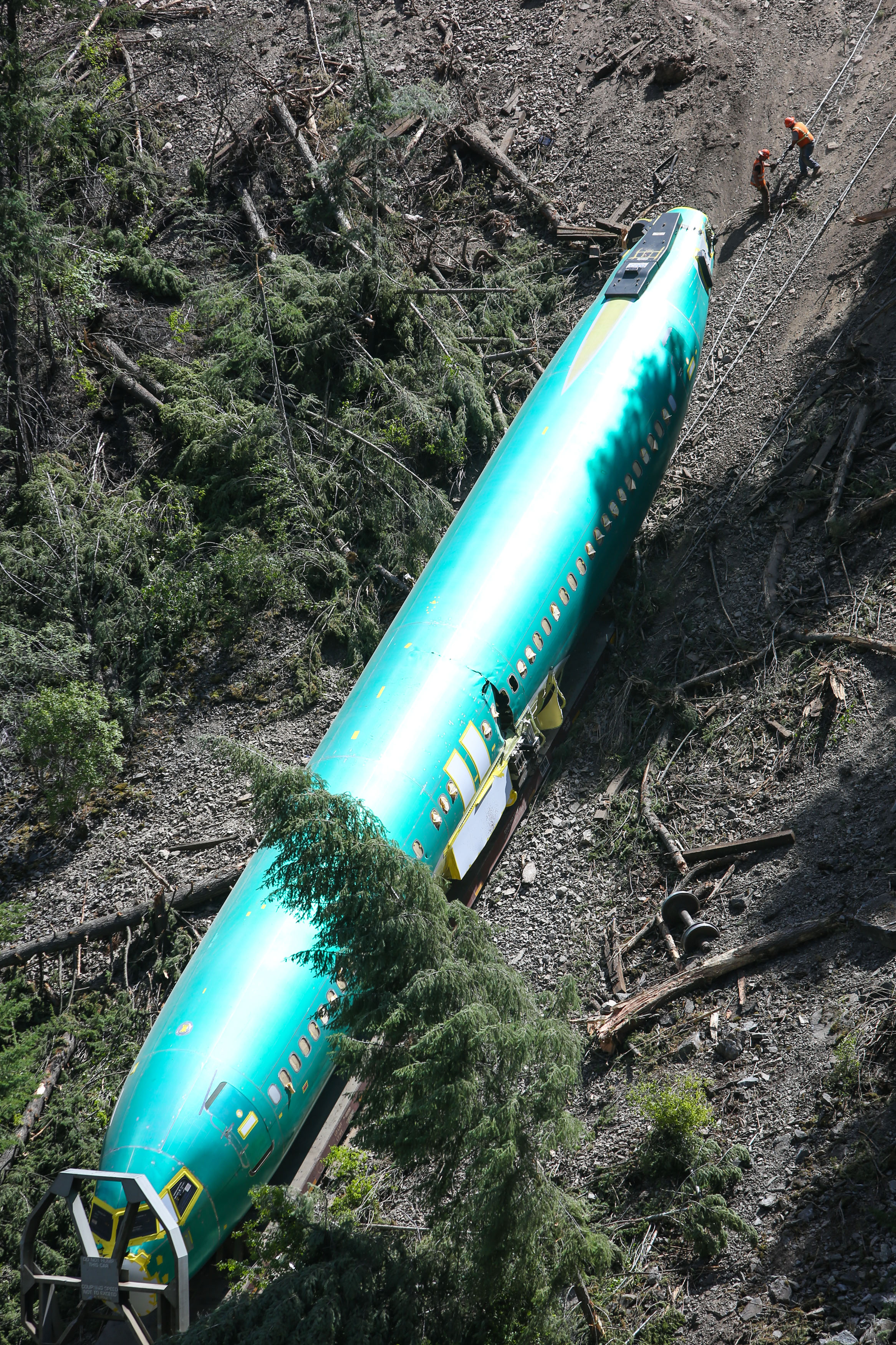 Derailed fuselages removed from Montana river