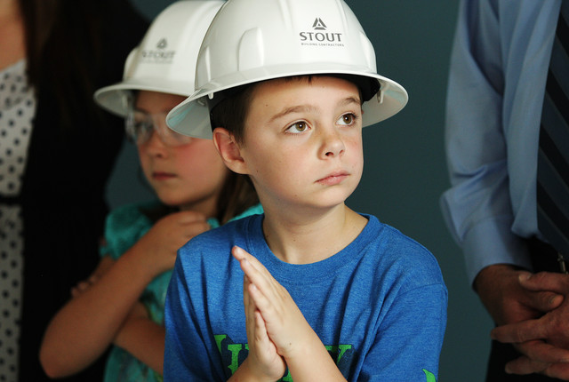 Future student Dallin Schmutz looks over things as Spectrum Academy, a charter school for students with high-functioning autism, gives a tour of the construction in Pleasant Grove Wednesday, July 9, 2014. The new Pleasant Grove school will serve kindergarten through eighth grades the first year, about 400 students, and continue to add grades until it serves 600 students in K-12. (Photo: Jeffrey D. Allred, Deseret News)