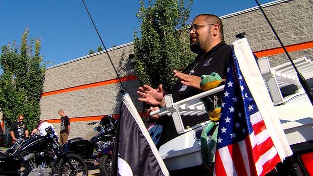 Zac Pau'u, who works in the homeless program with Salt Lake Citys Housing Authority, addresses motorcyclists participating in a ride to benefit homeless veterans on Saturday, July 12, 2014, in Salt Lake City. (Photo: Mike DeBernardo, KSL TV)