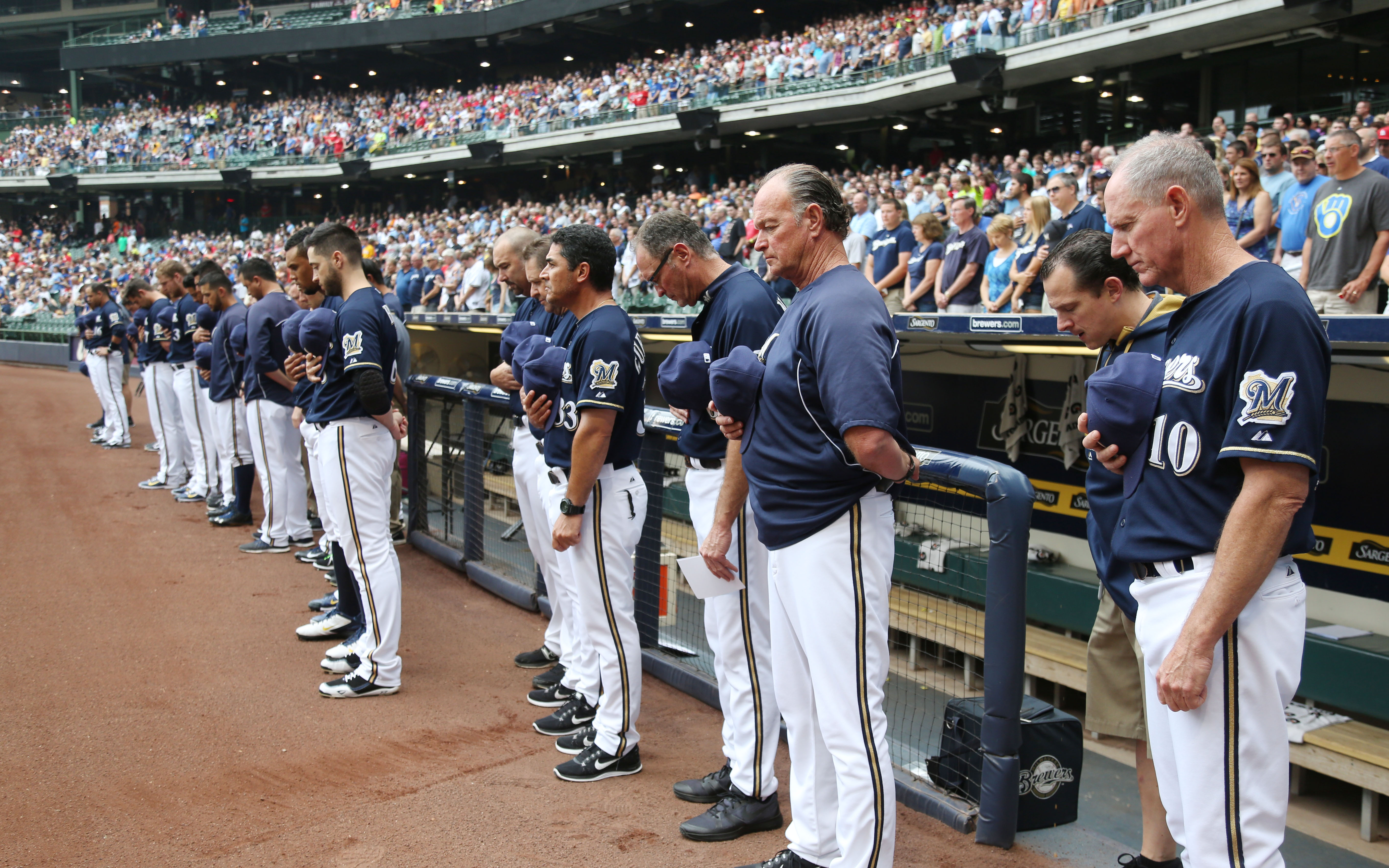 Segura out after son's death, Brewers fall to StL