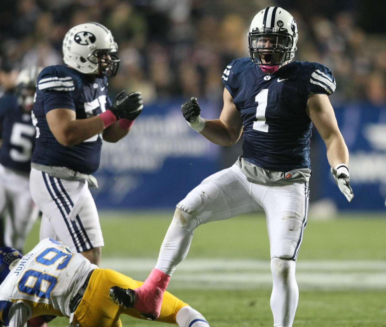 Brigham Young Cougars linebacker Jordan Pendleton (1) reacts to
tackling San Jose State Spartans wide receiver Chandler Jones
(89)during the first quarter of a football game at the Lavell Edwards
Stadium in Provo on Saturday, Oct. 8, 2011.