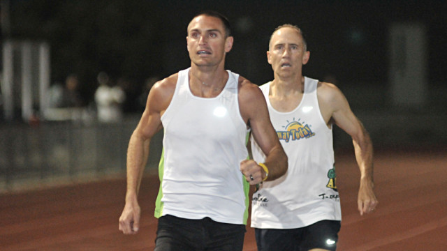 Friend and pacer, Darren Brown brings Brad
Barton through right on pace at the 800 M at
2:08. during Barton's most recent WR attempt.