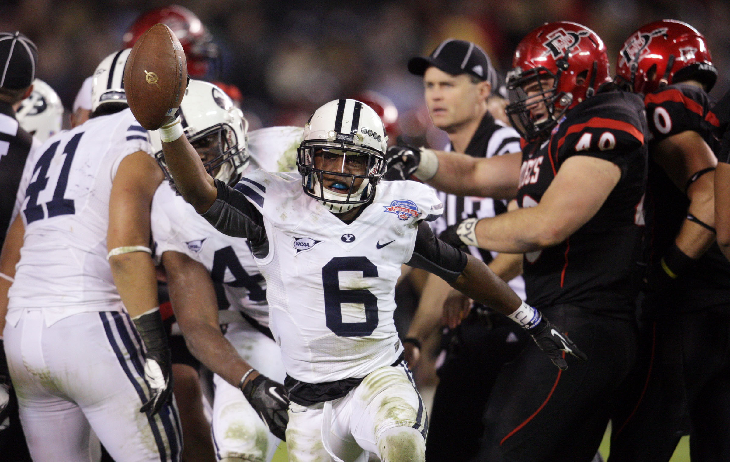 Brigham Young Cougars defensive back Jordan Johnson (6) comes up 
with a San Diego State Aztecs fumble which lead to a touchdown 
during the Poinsettia Bowl in San Diego Thursday, Dec. 20, 2012. 
Johnson's return to the secondary bolsters a unit that was 16th in the 
country in team passing efficiency defense in 2013.
