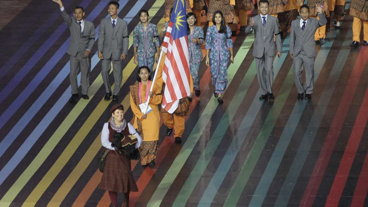 Silence for Malaysia jet victims at Glasgow Games