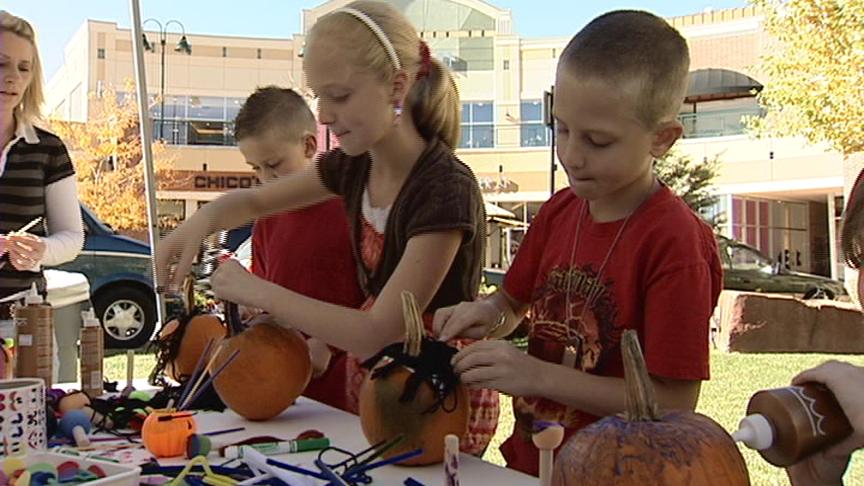 Children Spend Afternoon Painting Pumpkins