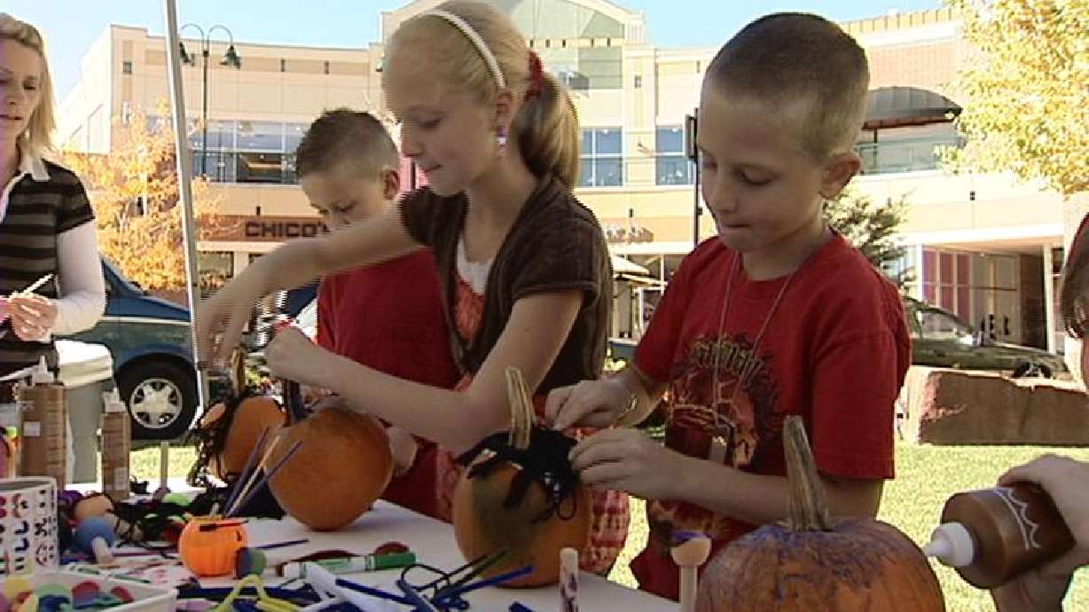 Children Spend Afternoon Painting Pumpkins