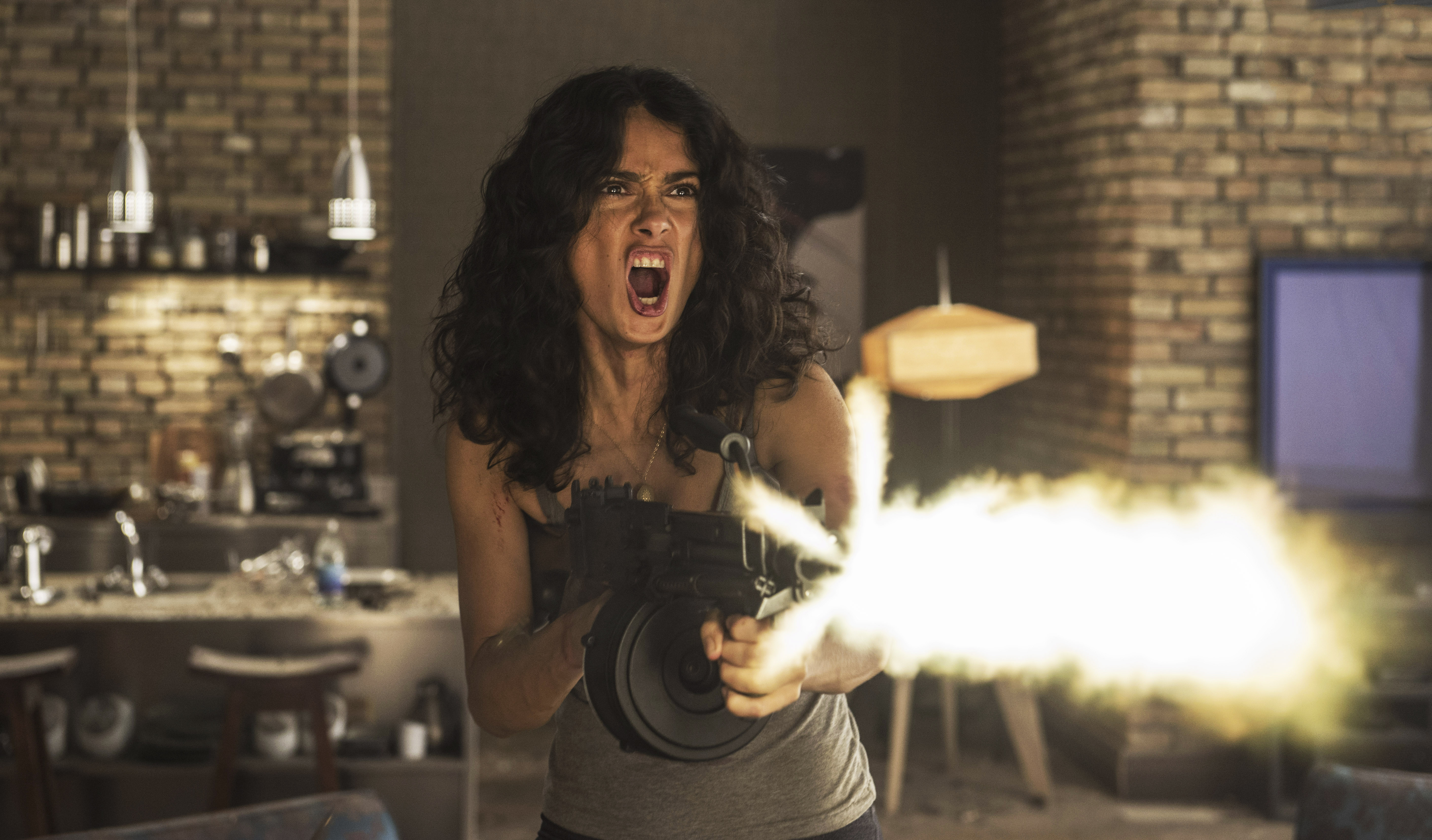 Salma Hayek pulls trigger on 'Everly' at Comic-Con