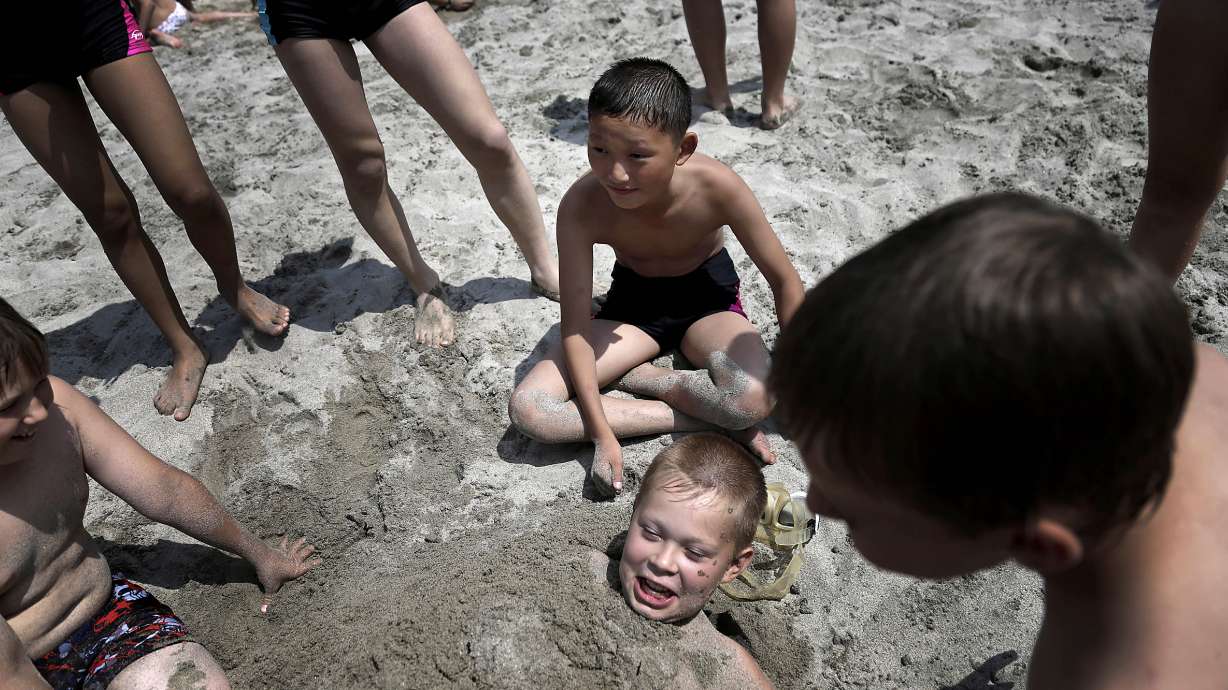 AP PHOTOS: NKorea opens summer camp for kids