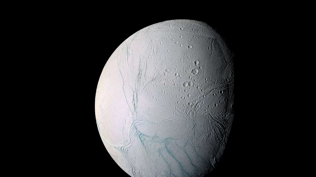 NASA finds evidence of liquid water on surface of Saturn moon