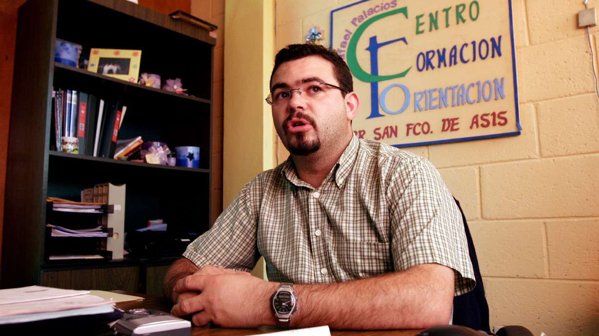 El Salvador charges priest with helping gang