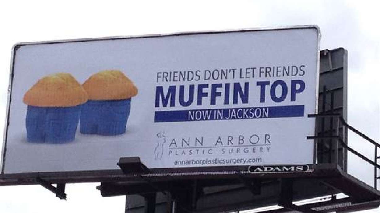 Billboard mocking 'muffin tops' gets makeover from graffiti artists