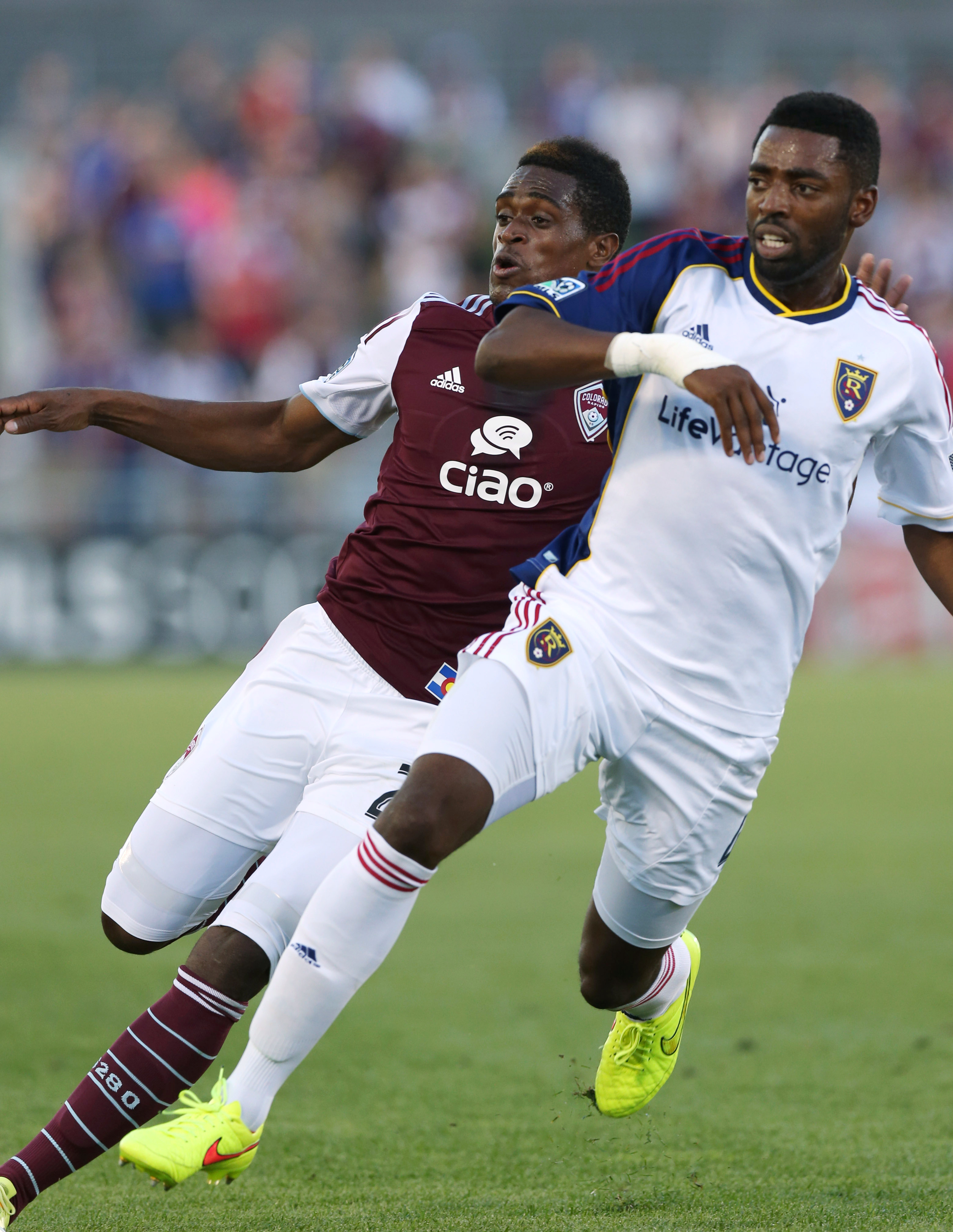 Real Salt Lake defenseman Aaron Maund, right, blocks Colorado Rapids forward Deshorn Brown as they compete for control of ball in the first half of an MLS soccer game in Commerce City, Colo., on Saturday, Aug. 2, 2014.