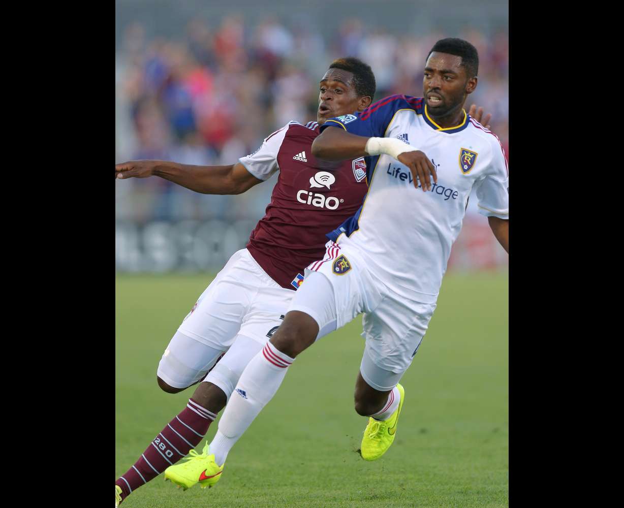 Real Salt Lake defenseman Aaron Maund, right, blocks Colorado Rapids forward Deshorn Brown as they compete for control of ball in the first half of an MLS soccer game in Commerce City, Colo., on Saturday, Aug. 2, 2014.