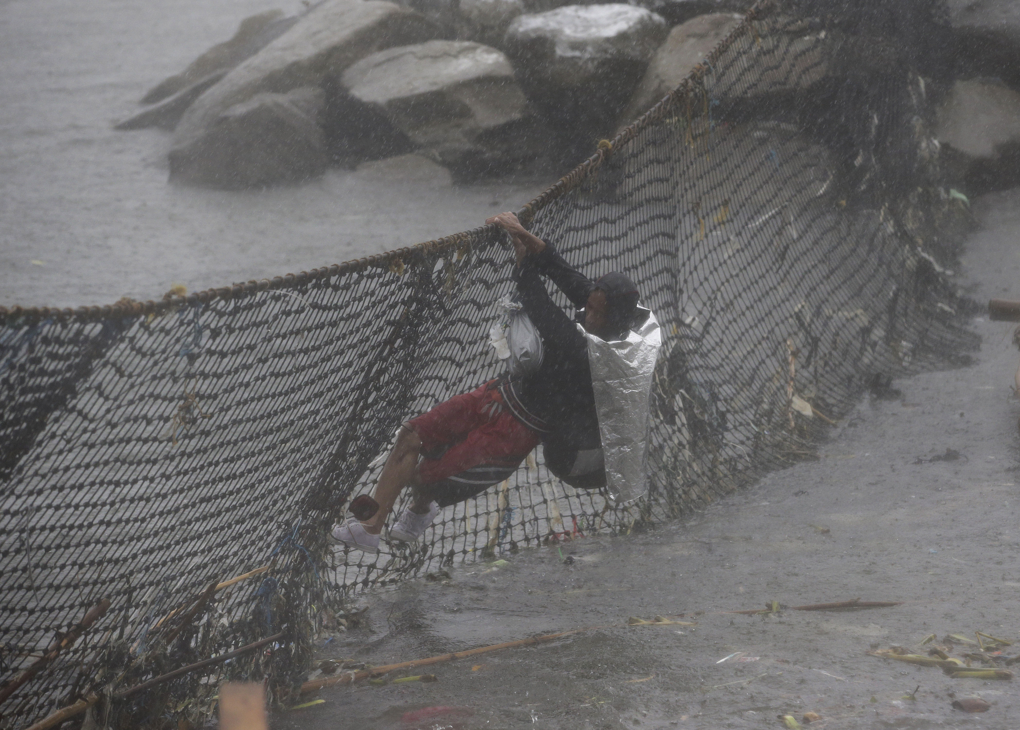 Monsoon rains flood farms in northern Philippines