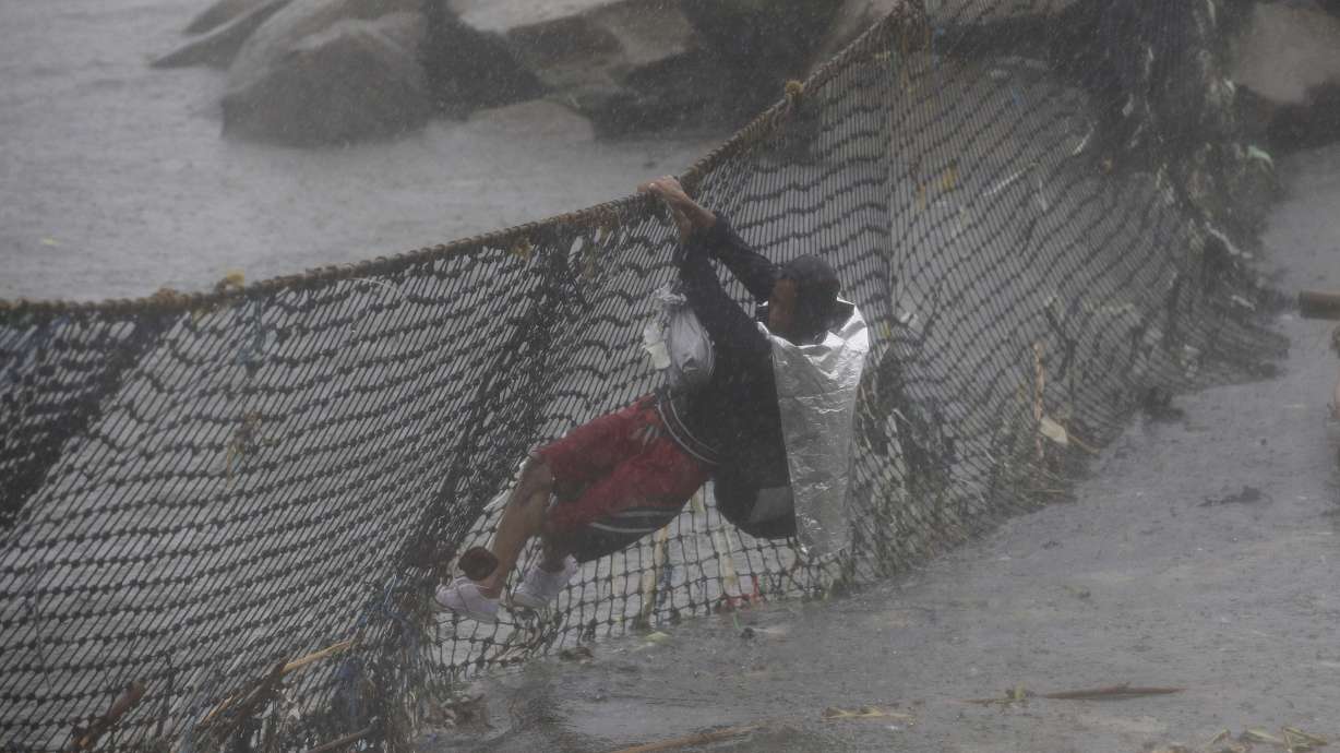 Monsoon rains flood farms in northern Philippines