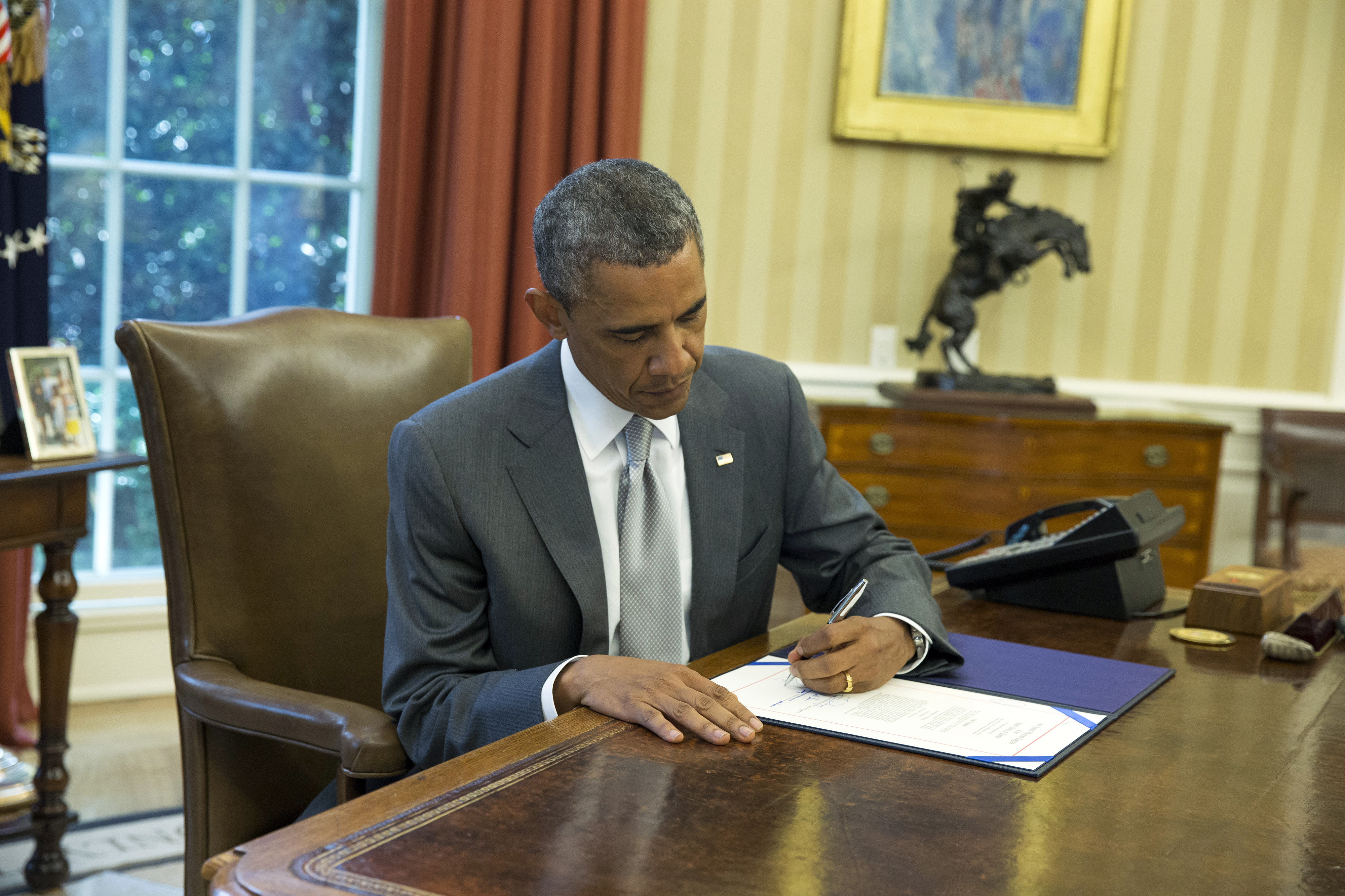 Obama signs funding package for Israel's Iron Dome
